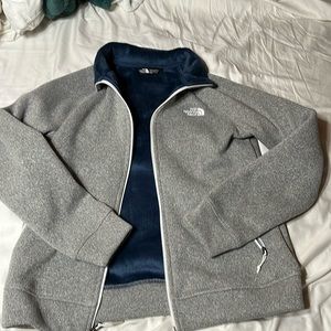 North Face size M, gray sweater with blue soft fleece inside.